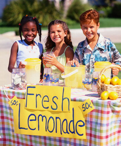 Children selling lemonade at a lemonade stand