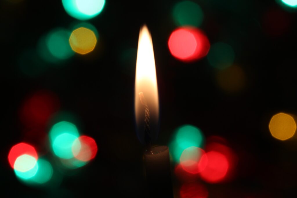 candle flame and christmas colors by D A V I D S O N L U N A