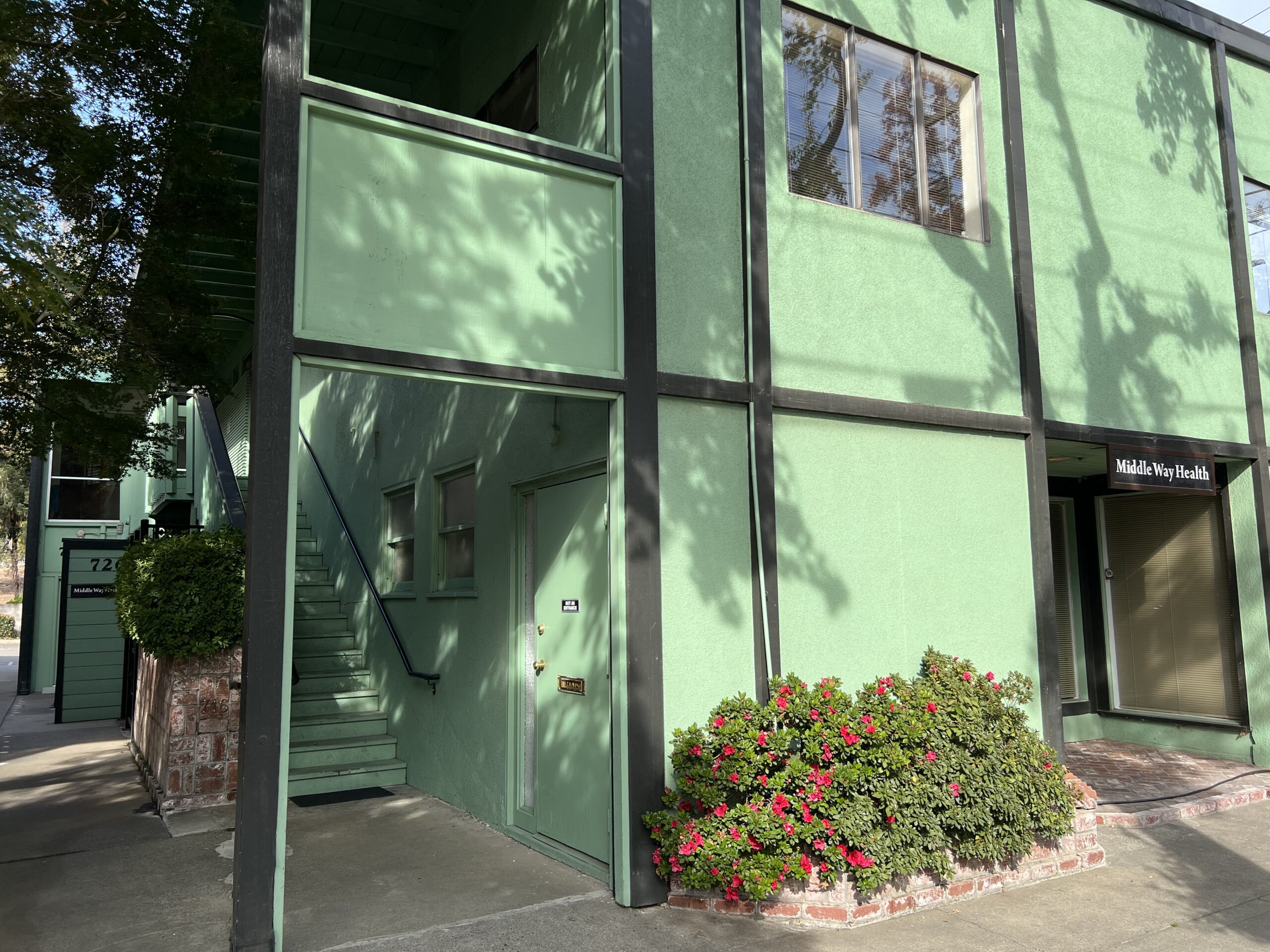 the front of the building and the entrance at Middle Way Health, Sacramento, california